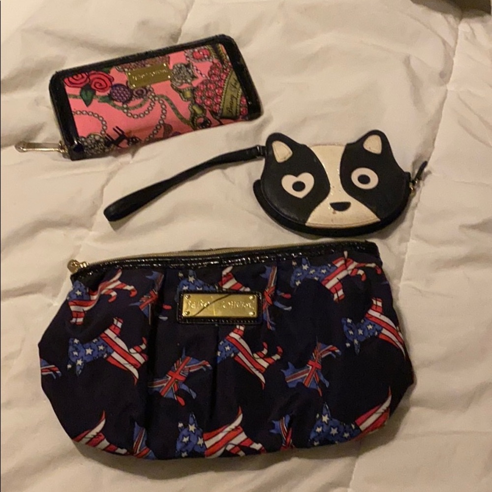 2 betsey johnson wallet and a makeup bag